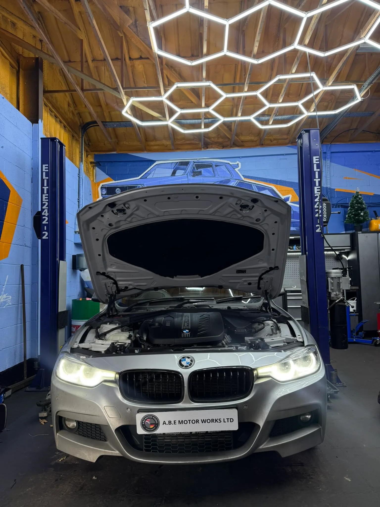 BMW with bonnet up