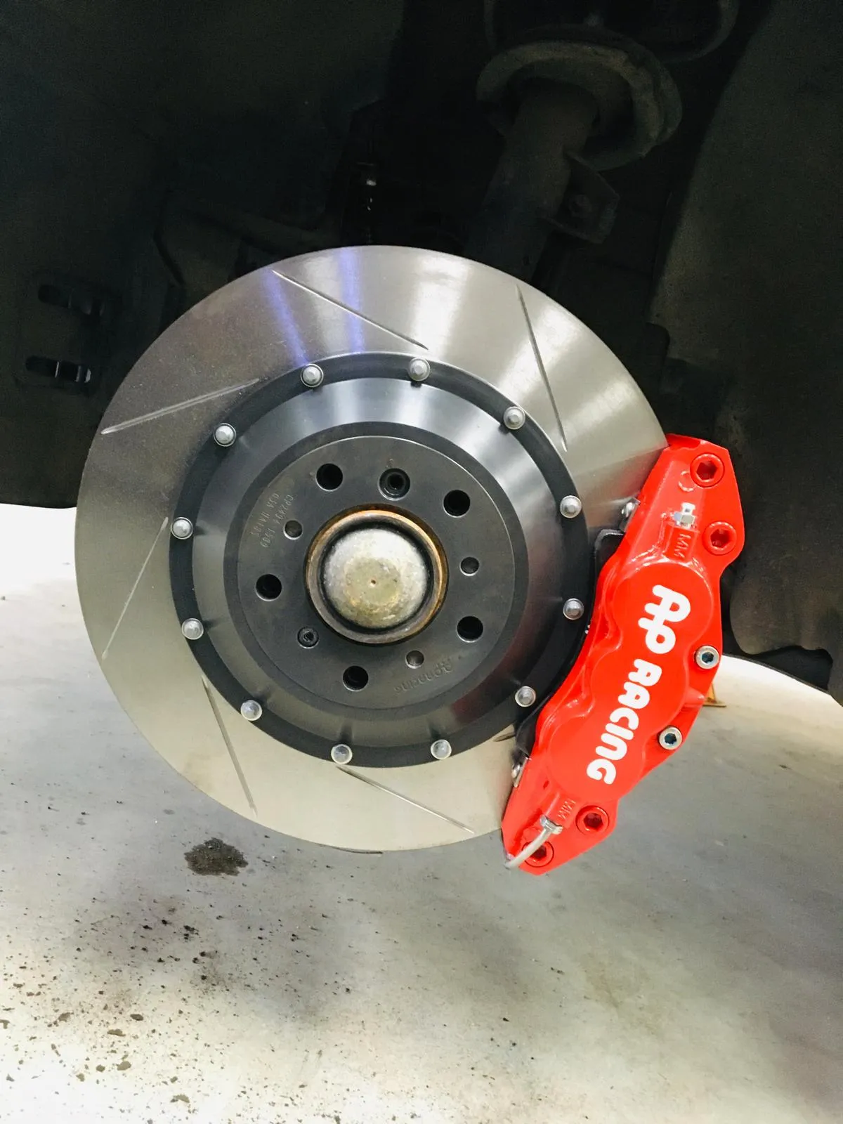 A close up of a brake on a vehicle.